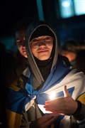 Boy with candle. Picture: Callum Mackay..