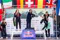 Watson (left) celebrates her silver medal on the podum. The windsurfing boards floating over the water are the trend of the last few years and will be included in the Olympic programme for the first time in 2024.