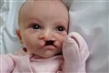 Baby in murder probe ‘melted the hearts of everyone who met her’