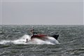 Man rescued and two missing after fishing boat sinks off coast of East Sussex