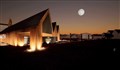 An artist's impression of the new visitor centre and landscape around it.