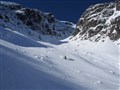 Taking advantage of a one-day-window to ski powder below Upper Martini Couloir on Aonach Beag. Skier: Kenny Biggin. Photo: Neil Muir