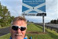 Retired banker reaches Scotland after running 50 marathons along the coast