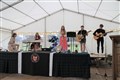 The school's musical talent put on a performance at the bash.