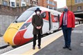 Railway historian Dr David Turner (left) and LNER Safety and Operations Director Warrick Dent pictured with the first LNER Azuma passenger service arriving through the newly reopened third tunnel. Photo: Matt Crossick/PA Wire