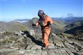 Fundraiser completes second peak wearing deep-sea diving suit