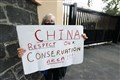 Residents protest over Chinese Consulate wall built without planning permission