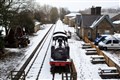 Parts of UK hit by heavy snowfall as forecasters warn of wet week ahead