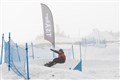 Getting a good edge in the carve on the banked slalom course.