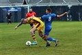 Strathspey Thistle defender Cameron Lisle (right) tussles for the ball.