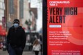 UK approves Oxford vaccine as millions more people face toughest lockdown