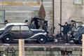 Michael Gray (played by Finn Cole) is surrounded by gangsters on set during a break in filming at Portsoy. Picture: Daniel Forsyth