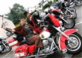Fire-eating Harley fans Random Mike and Gareth Davis (seated) at the Kingussie rally