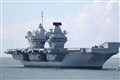 Aircraft carrier sets sail after two-day delay caused by Covid-19 outbreak