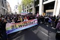 Police investigate after statues daubed with graffiti during trans rights rally