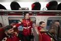 In Pictures: Bearskin caps in the luggage rack as Coldstream Guards return home