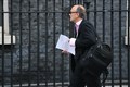 Cummings pictured in Downing Street with archive document on defence