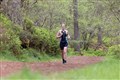 Women's open category winner Samantha Macleod on the running leg through the Anagach Woods. Picture: Jane Hope.