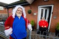 Santa lookalike care worker delivers festive cheer on home visits