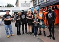Some rally goers in fancy dress
