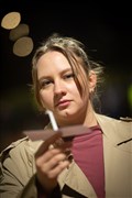 Woman with candle. Picture: Callum Mackay..