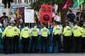 Protests to resume in London despite dozens of arrests