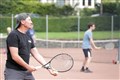 Glen Tonkin gets ready to serve at the tournament.