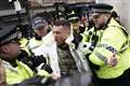 Tommy Robinson charged with criminal offence after arrest at antisemitism march