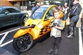 Finlay Gethins (7) beside a Carver Speciale.