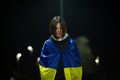 Nastia (Anastasiia) Maistrenko with Ukraine flag. Picture: Callum Mackay..