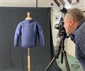 Jim Dunn photographing a gansey in Wick Heritage Museum.