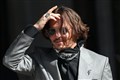 Ruling due in Johnny Depp’s blockbuster libel action against the Sun newspaper