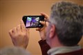 Taking a photo. Picture: James Mackenzie.