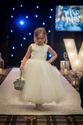 A cute flower girl showing off this lovely dress. Picture: Callum Mackay.