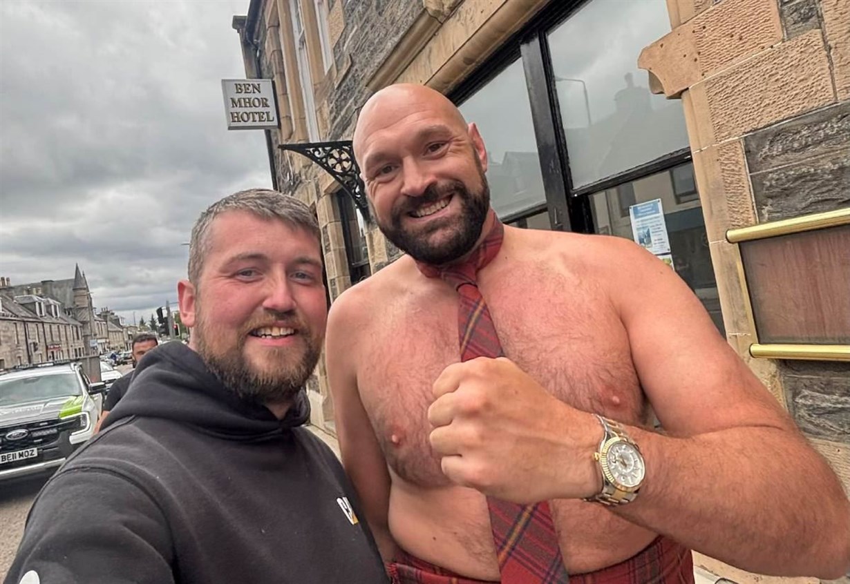 WATCH: Boxing champion Tyson Fury spotted strolling barechested and in kilt along Grantown’s High Street