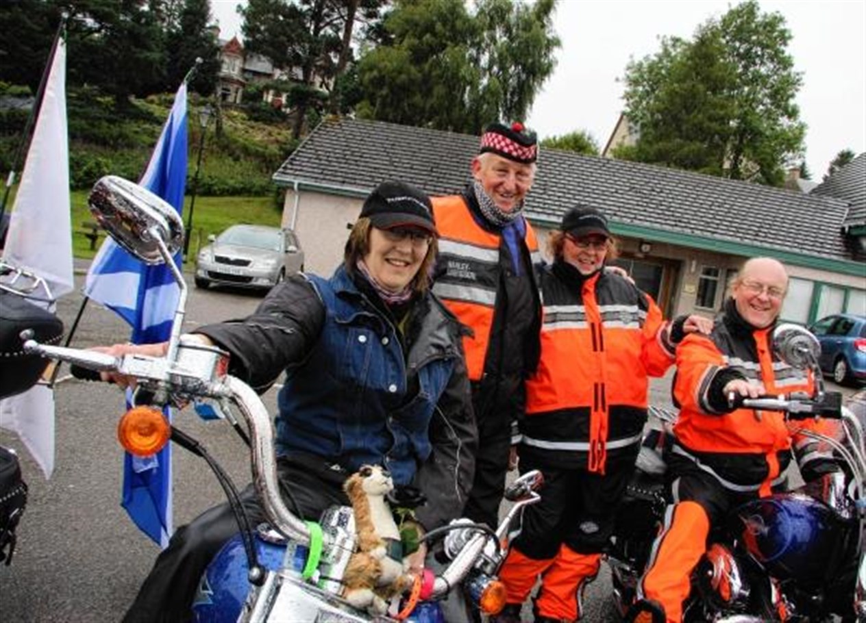 Jim and Fran Anderson with fellow Harley fans in Kingussie