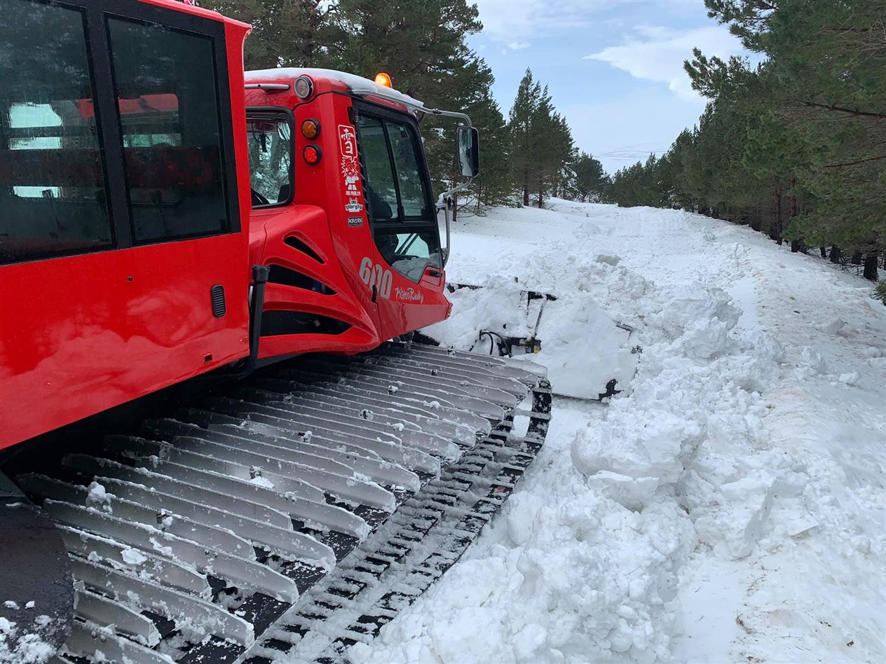 All uphill work, clearing the snow from the Cairngorm Ski Road to reach the resort.