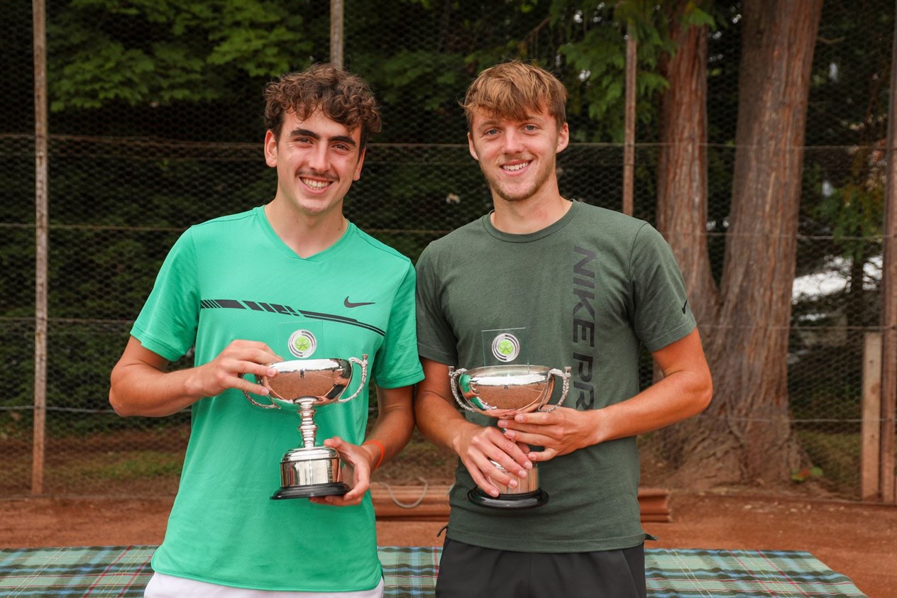 The men's doubles winners Ross Lyon and Fergus Mcwilliam with their trophies.