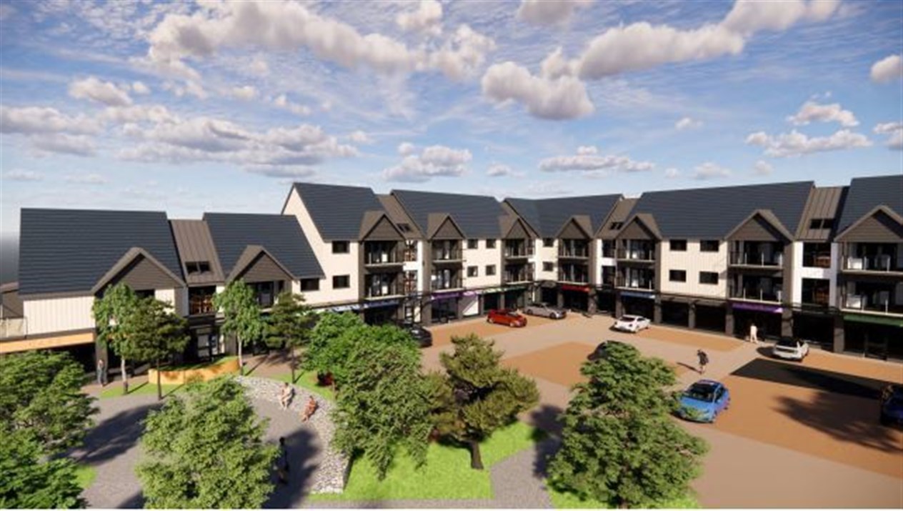 A view of the apartments and ground level shops.