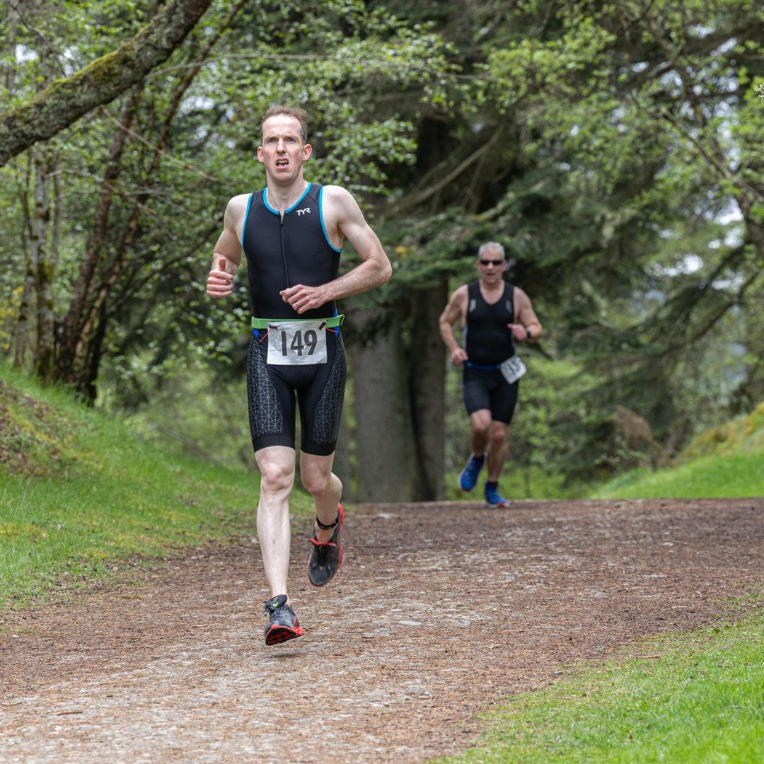 Men's open category winner Andrew McGhee running through Anagach Woods. Picture: Jane Hope.