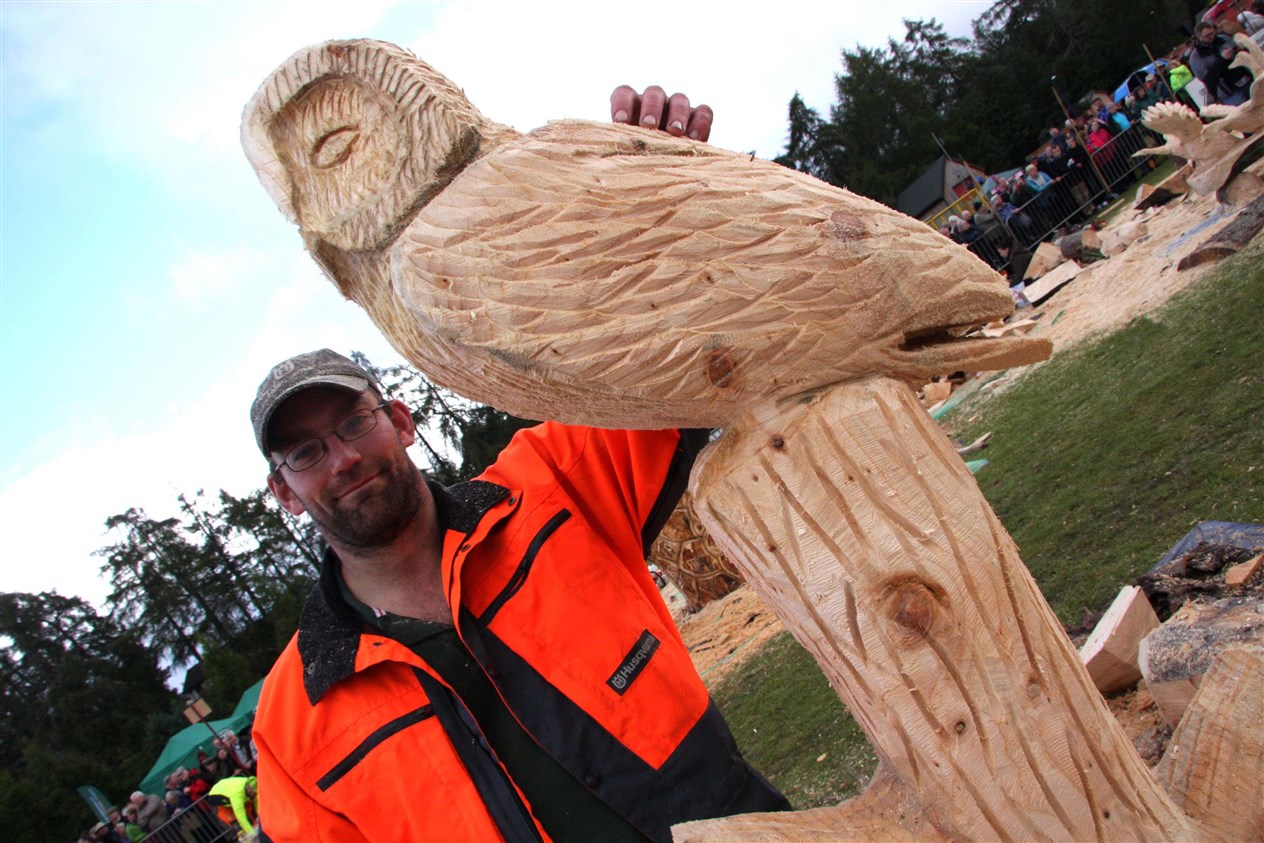 Hamish Maxwell with his carving 'Lookout Post'.