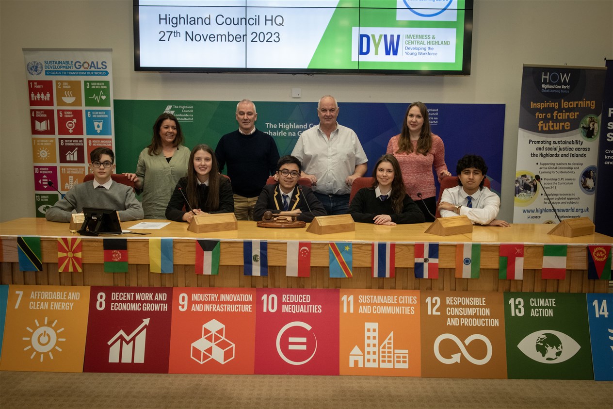 Amongst those addressing climate fears were (back) Catriona Willis Global Learning Co-ordinator, Councillor Karl Rosie, Councillor Raymond Bremner and Gemma Burnside, (front) Riley McLeod Taylor, Sophie Lambert, Mark Fernando, Ella Paterson and Asan Hussain. Picture: Callum Mackay.