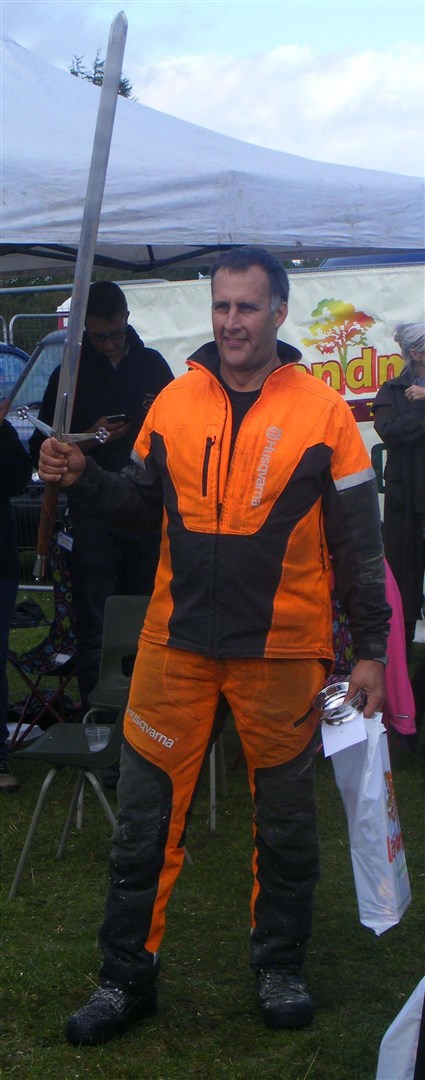 Winner Pete Bowsher with his prize.