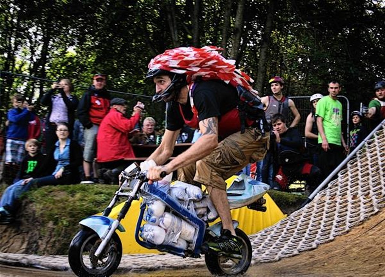 A daredevil takes off on a mini-moto (Olly Bowman)