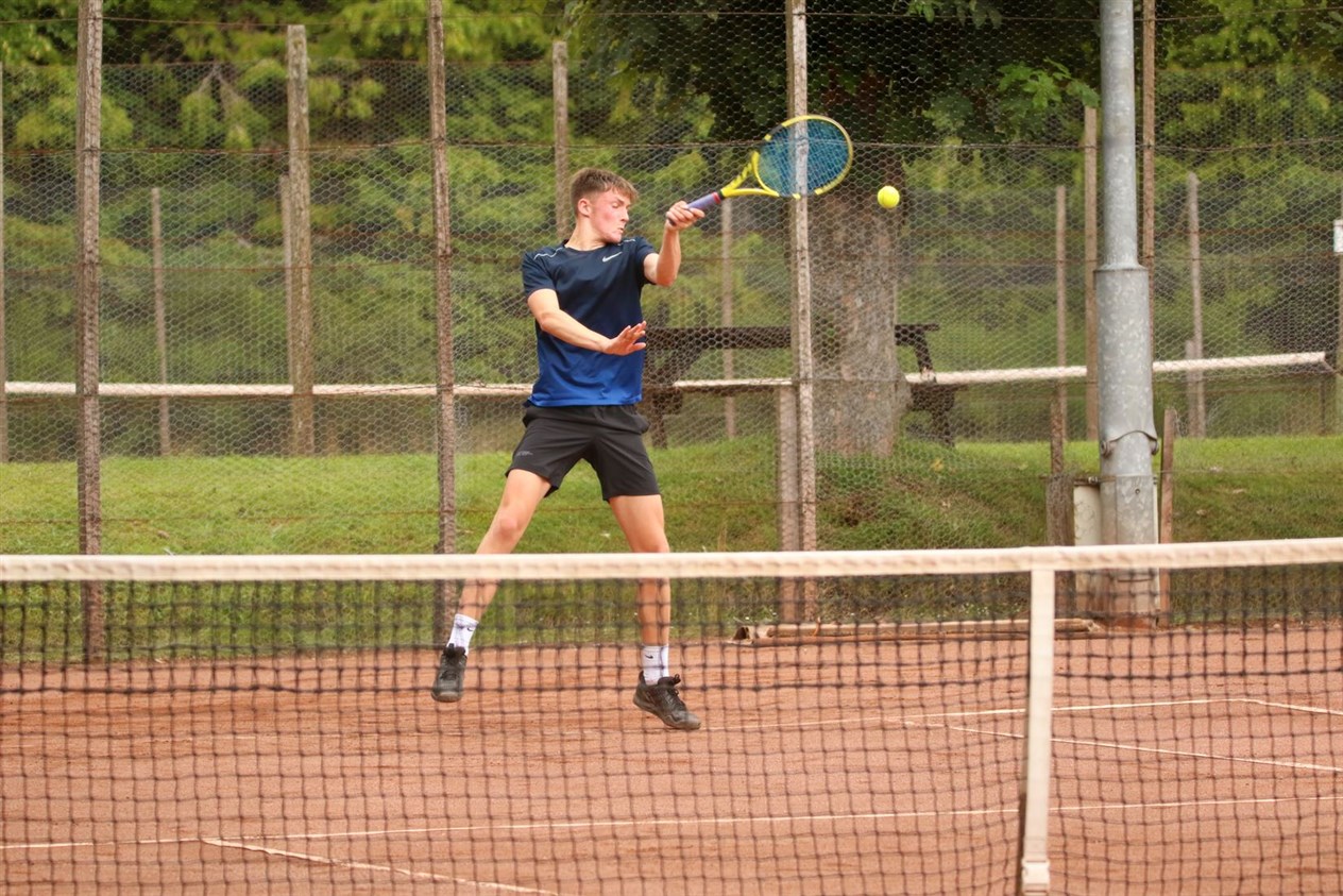 Sandy Mcwilliam in action in the men's singles competition.