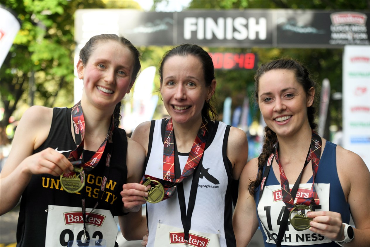 Rosa Donaldson came 3rd, Melissa Gibson came 1st and Doireann Hughes came 2nd in the 2023 Loch Ness Marathon. Picture: James Mackenzie.