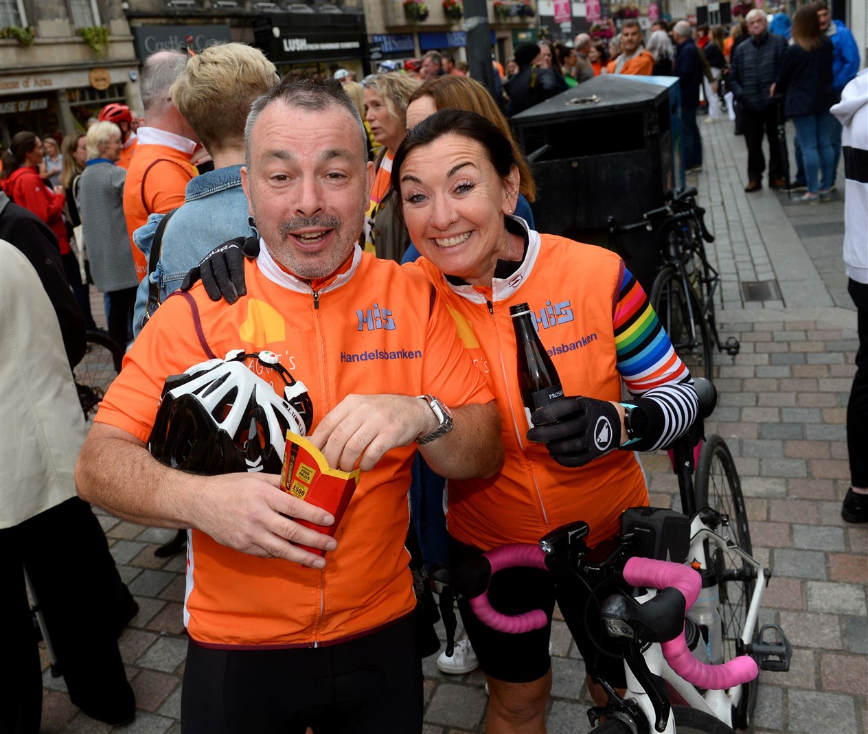 Keith McCaffery and Fiona Grist enjoy chips and a beer at the finish. Picture Gary Anthony