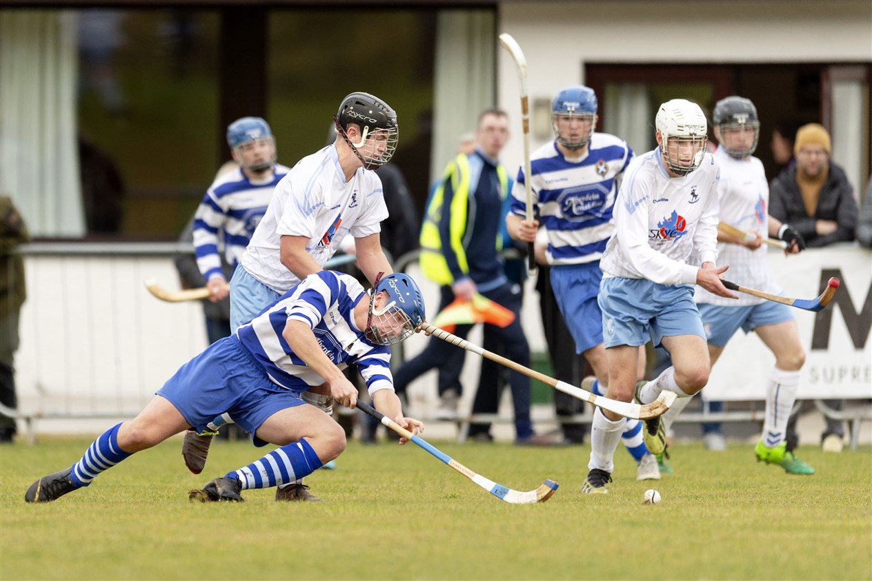 Struan Ross (Newtonmore) up against Ross Gordon (Skye).