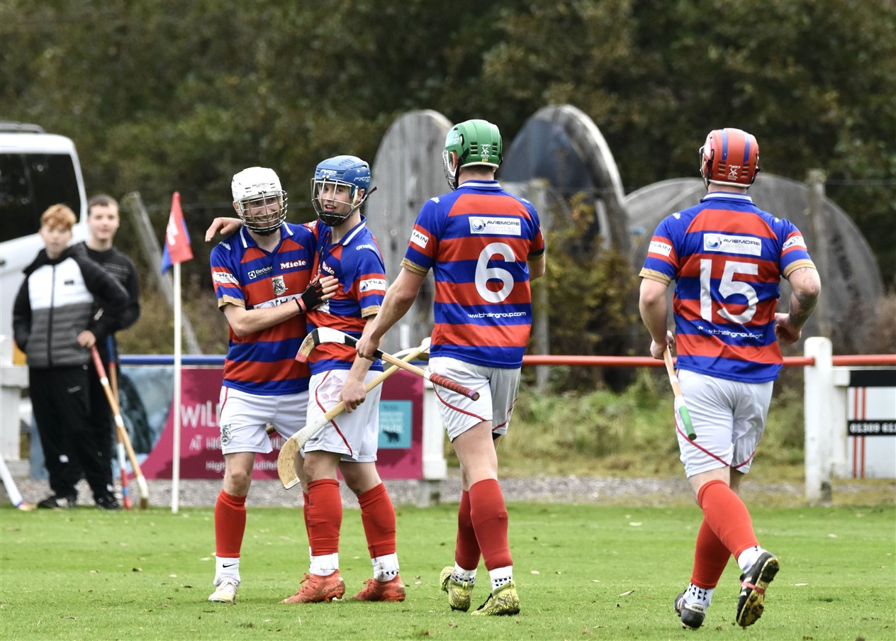 Ruaridh Anderson being congratulated by James Falconer, Calum MacKintosh and Savio Genini. Picture: Fiona Young.