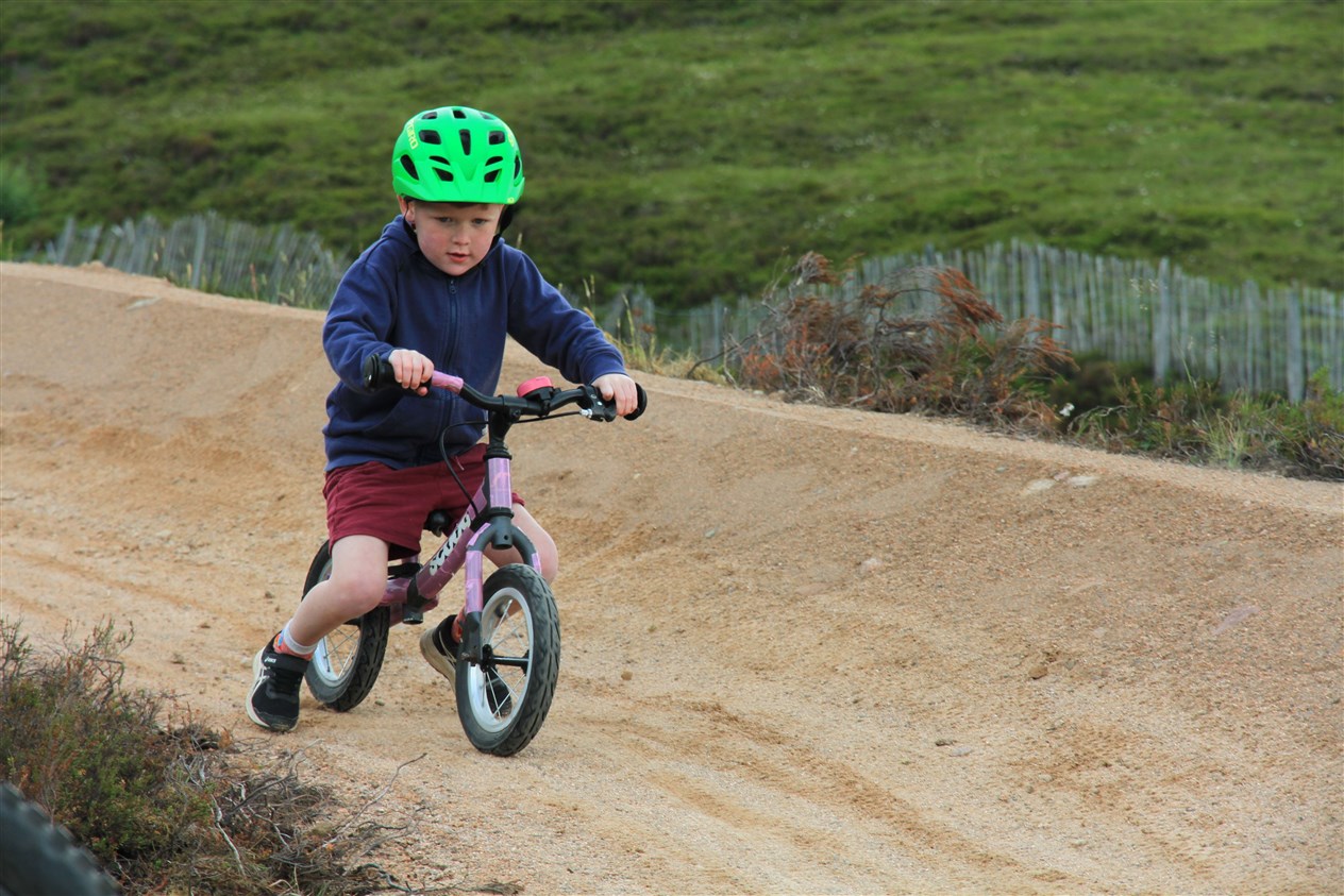 One of the young visitors keen to try out the new gravity bike trails which have been designed to appeal to a range of abilities.